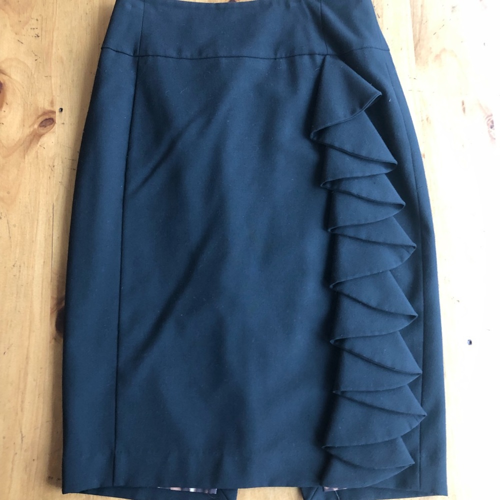 Ruffled pencil skirt with leopard lining.